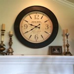 Large Wall Clock Above Fireplace